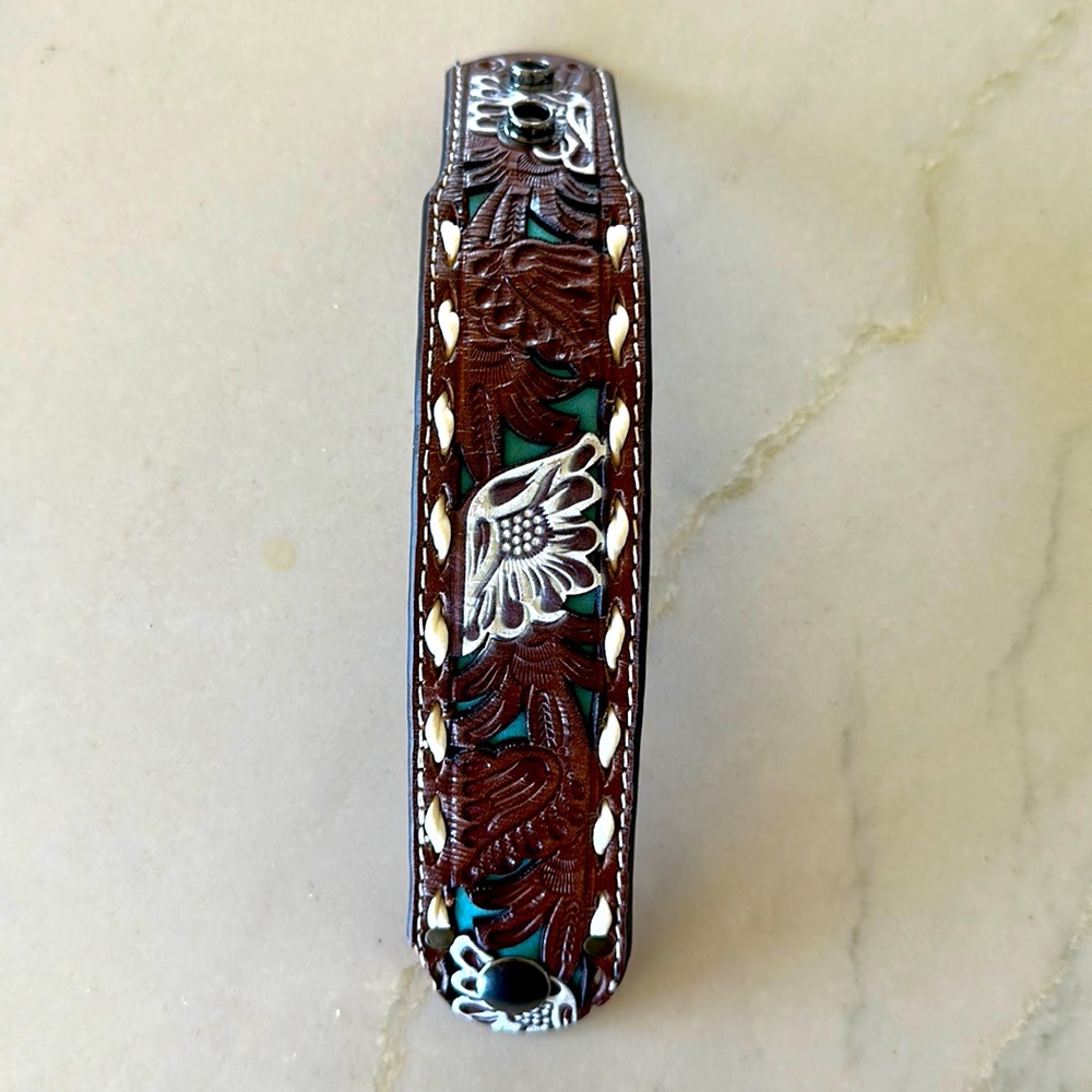 Women’s western leather “belt” bracelet.